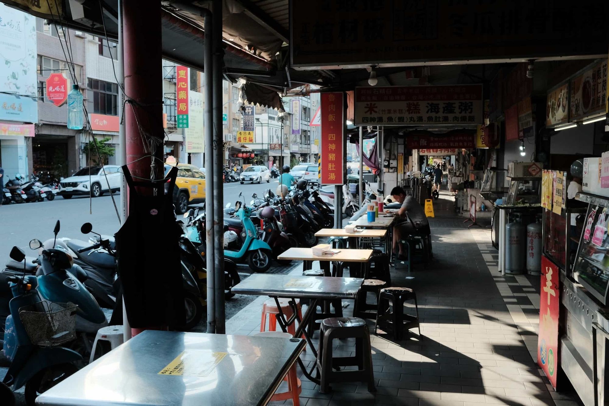 Breakfast scene in a food stall at a street